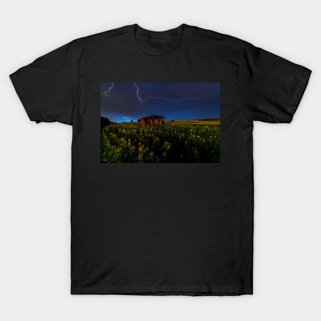 Lightning over the canola field T-Shirt by dags